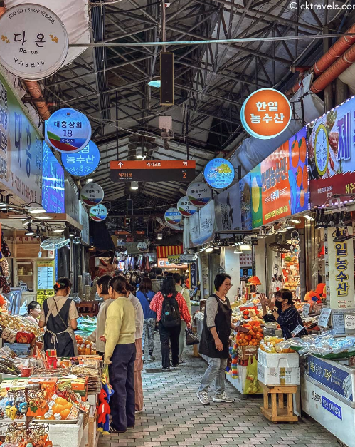 Regional Korea Travel highlight: Dongmun Market in Jeju City, a lively traditional Korean market with fresh produce, seafood, and local snacks.