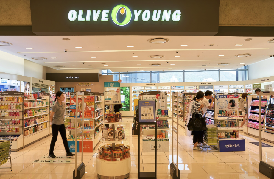 Olive Young Seongsu flagship store interior in Seoul showing K-beauty skincare and makeup shelves