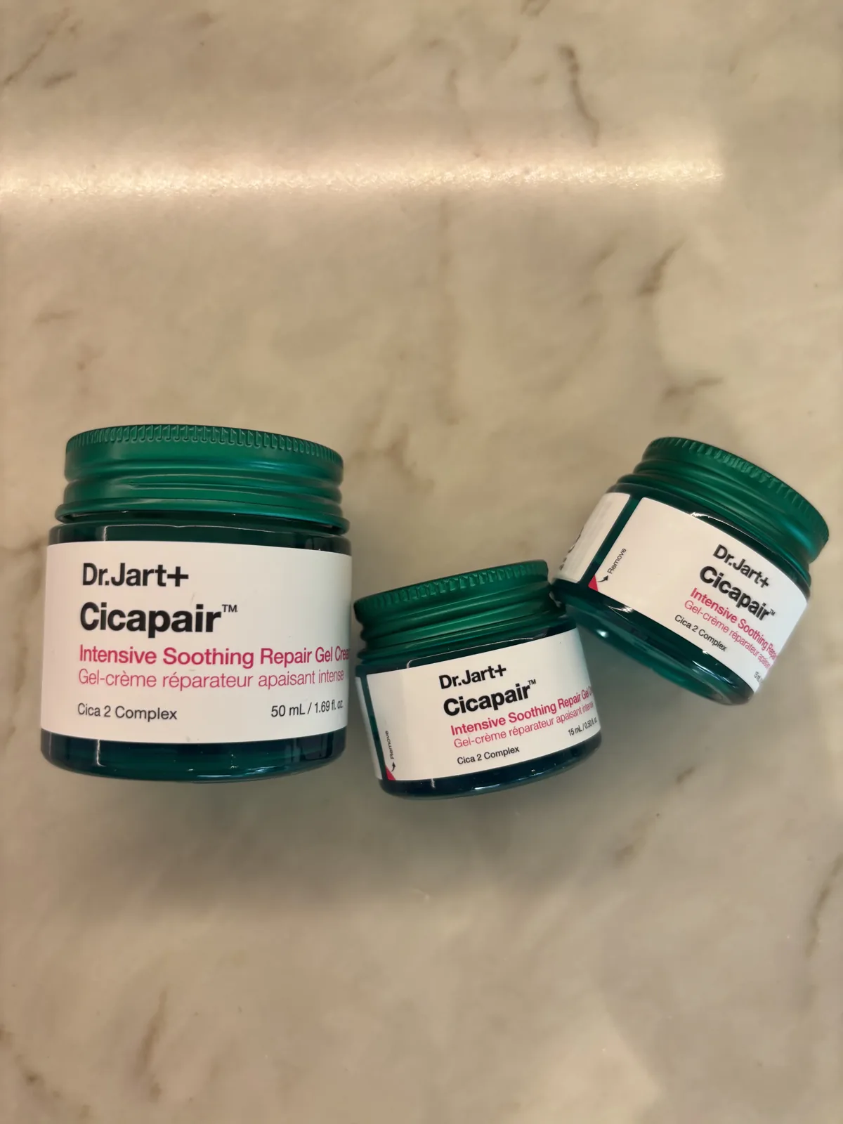 Dr.Jart Cicapair Gel Cream green glass jars with silver lids and Cica 2 Complex