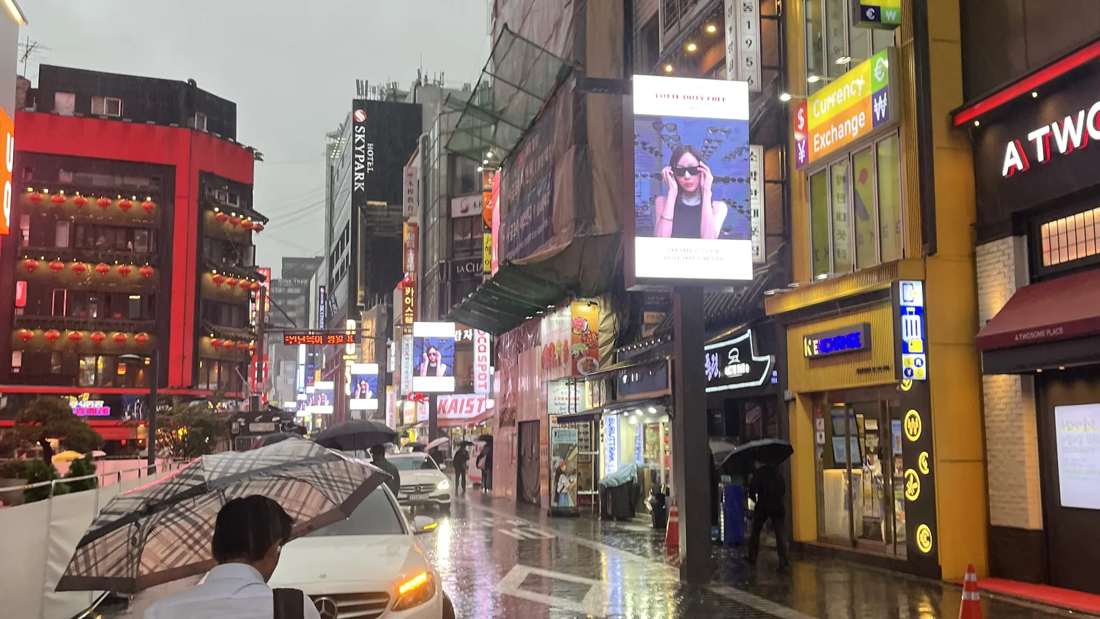 Myeongdong at night with neon signs lighting up the main shopping street