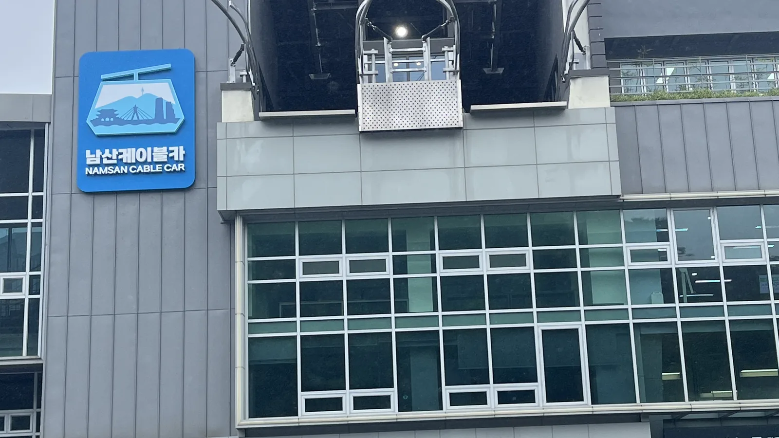 Namsan cable car guide view of the lower cable car station building entrance