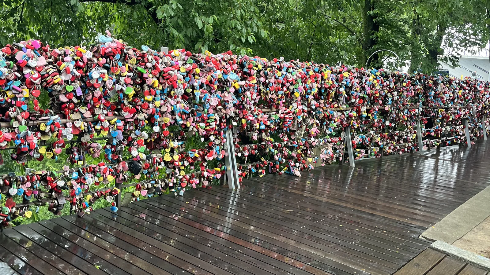 Namsan love locks covering a wooden terrace below N Seoul Tower