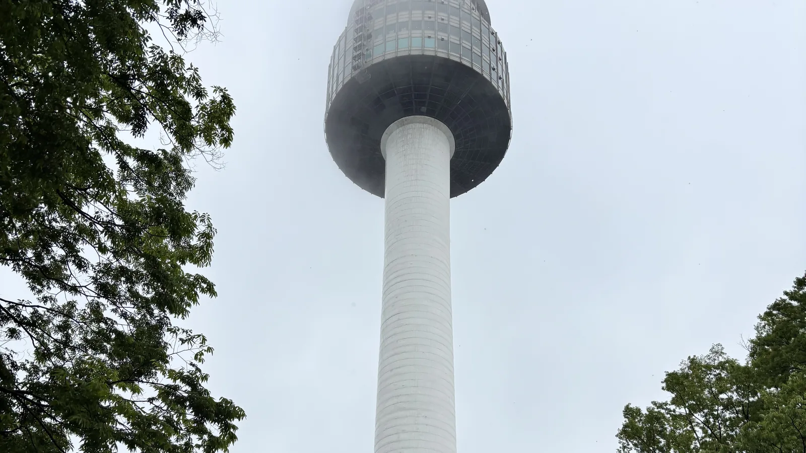 Namsan Seoul Tower guide view of N Seoul Tower observation deck on an overcast day