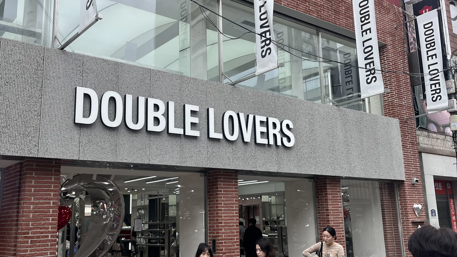 Korean fashion brands in Seongsu — the DOUBLE LOVERS eyewear storefront with sunglasses on display