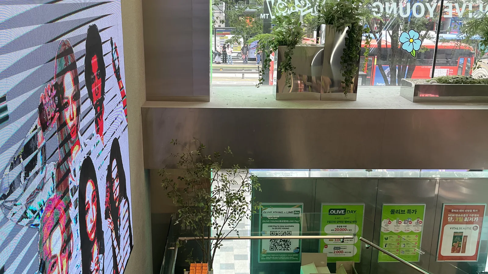 Olive Young toners and essences shopping inside a bright Gangnam Olive Young store interior