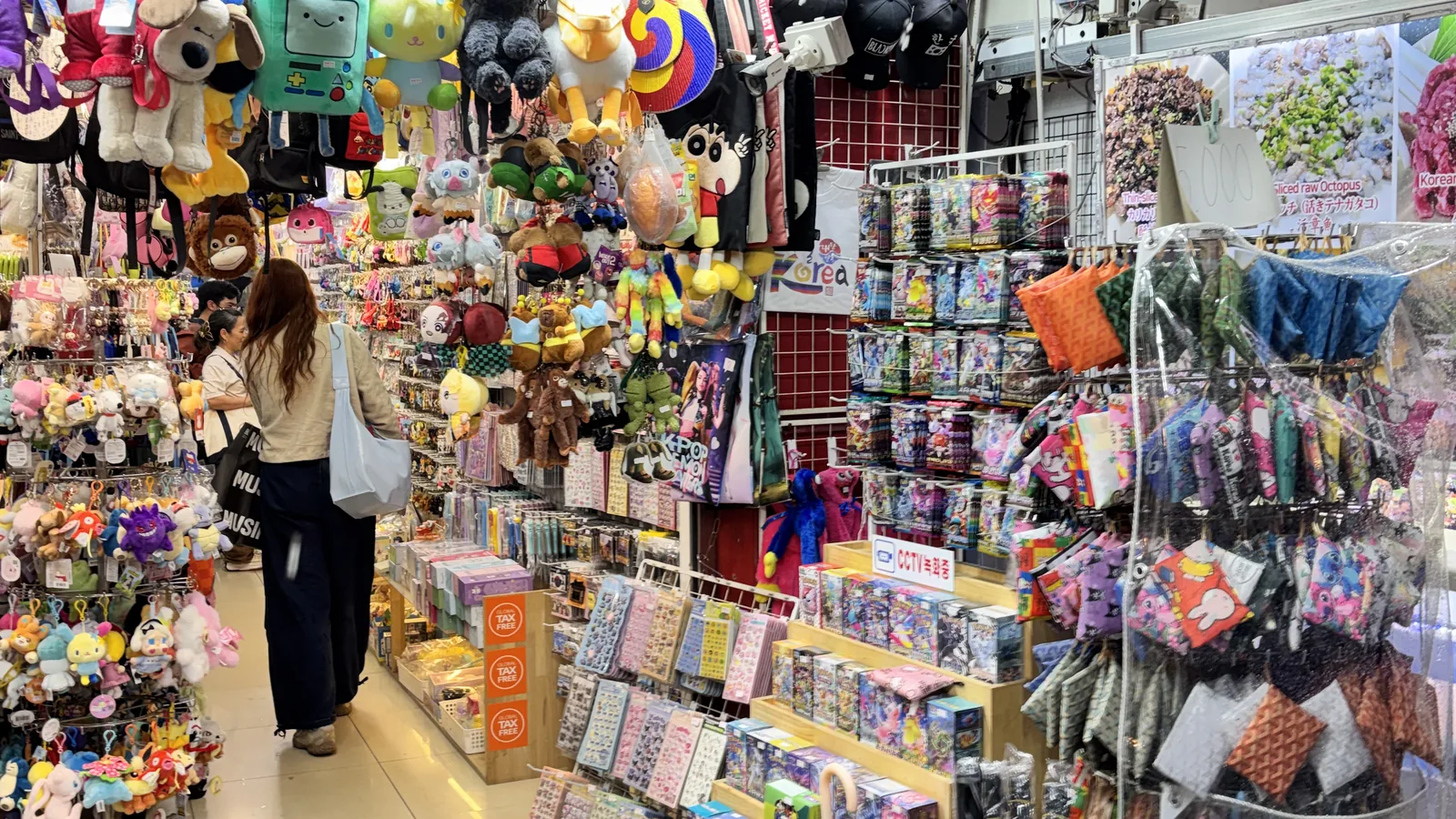 What to buy in Myeongdong — a souvenir shop packed with keyrings, socks and trinkets