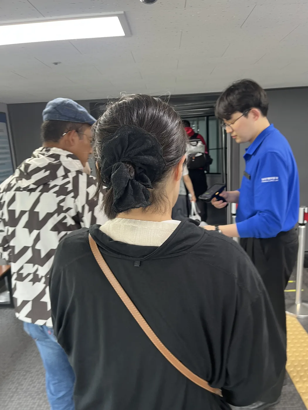 Namsan cable car guide view of passengers waiting at the boarding gate before the ride