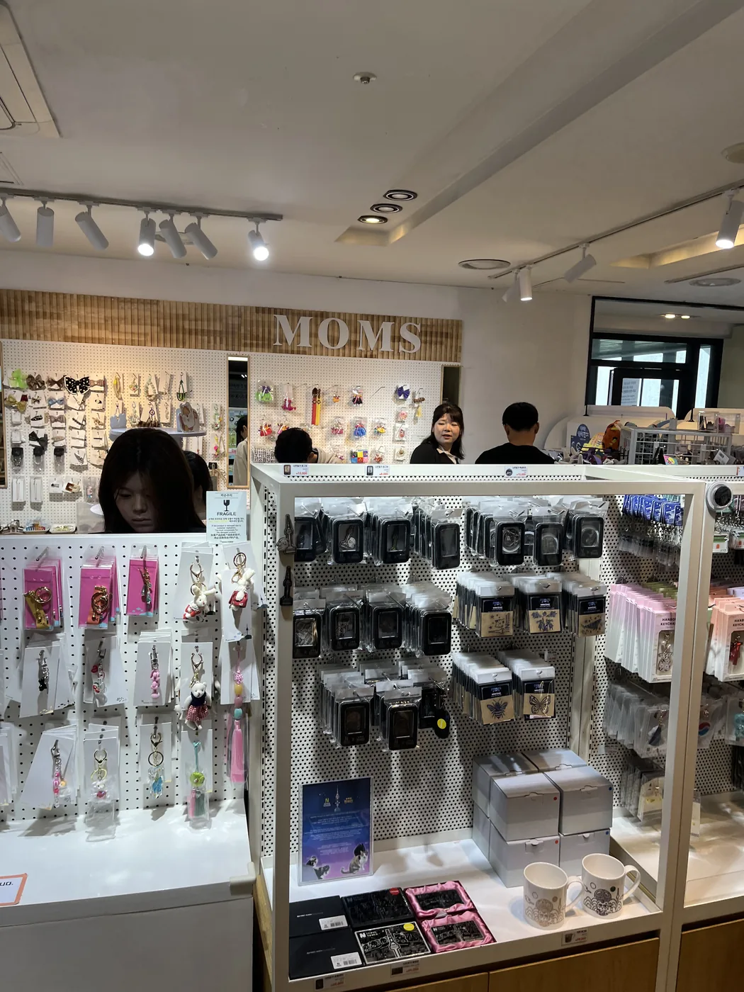 Namsan in the rain sheltering inside the bright tower-base gift shop