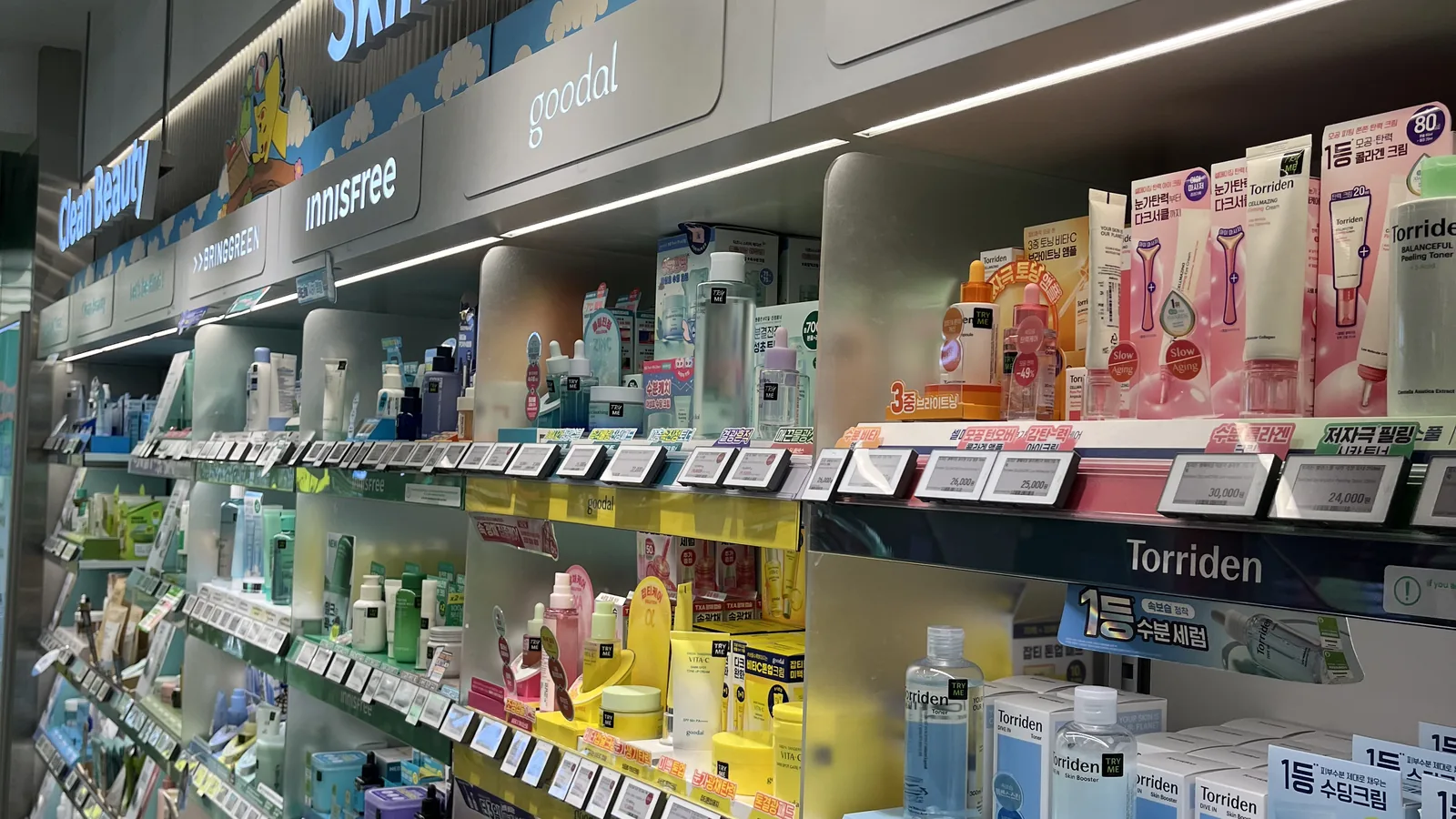 Olive Young for sensitive skin shopping on a skincare shelf with gentle toners and creams