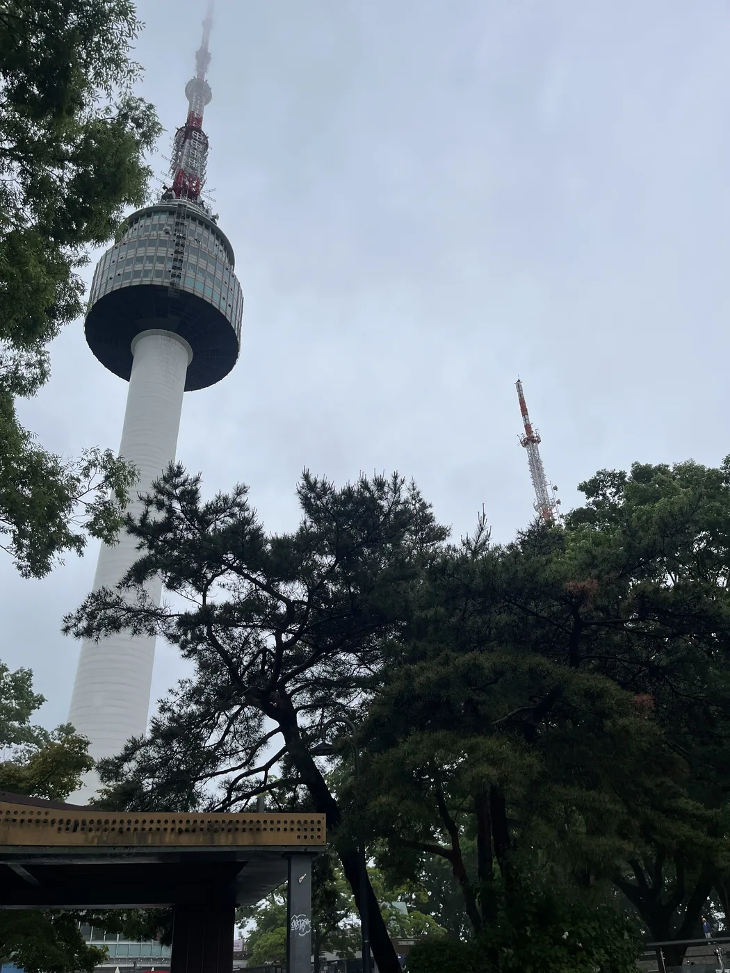Namsan cable car guide view of N Seoul Tower seen from below on arrival