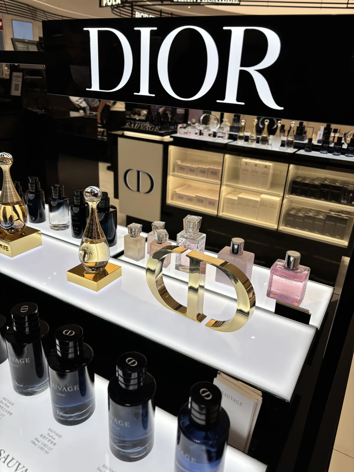 Dior perfume counter at Incheon Airport duty-free with rows of fragrance bottles