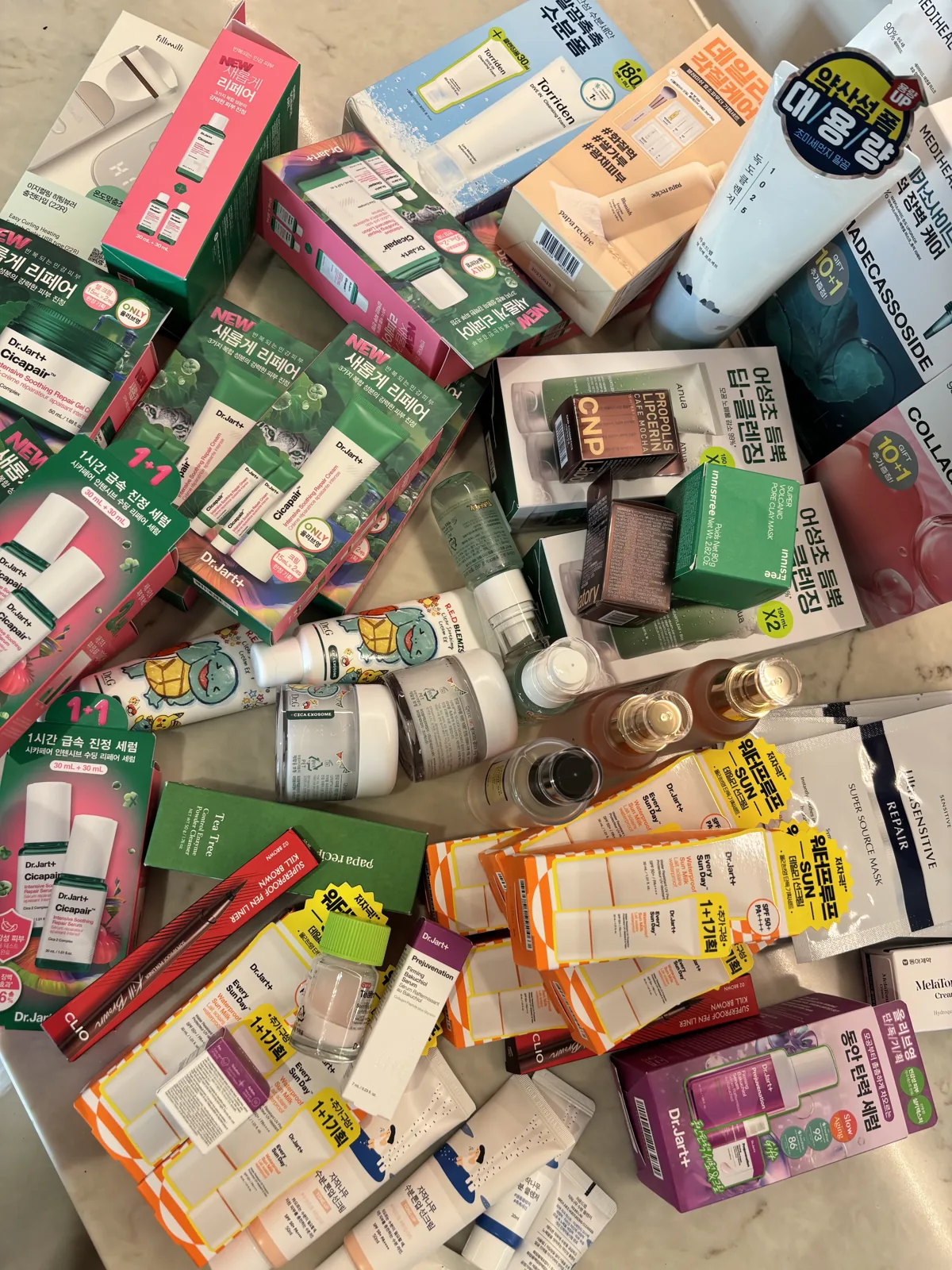 Mediheal Ceramide Mask packs in an Olive Young haul flat-lay of Korean skincare