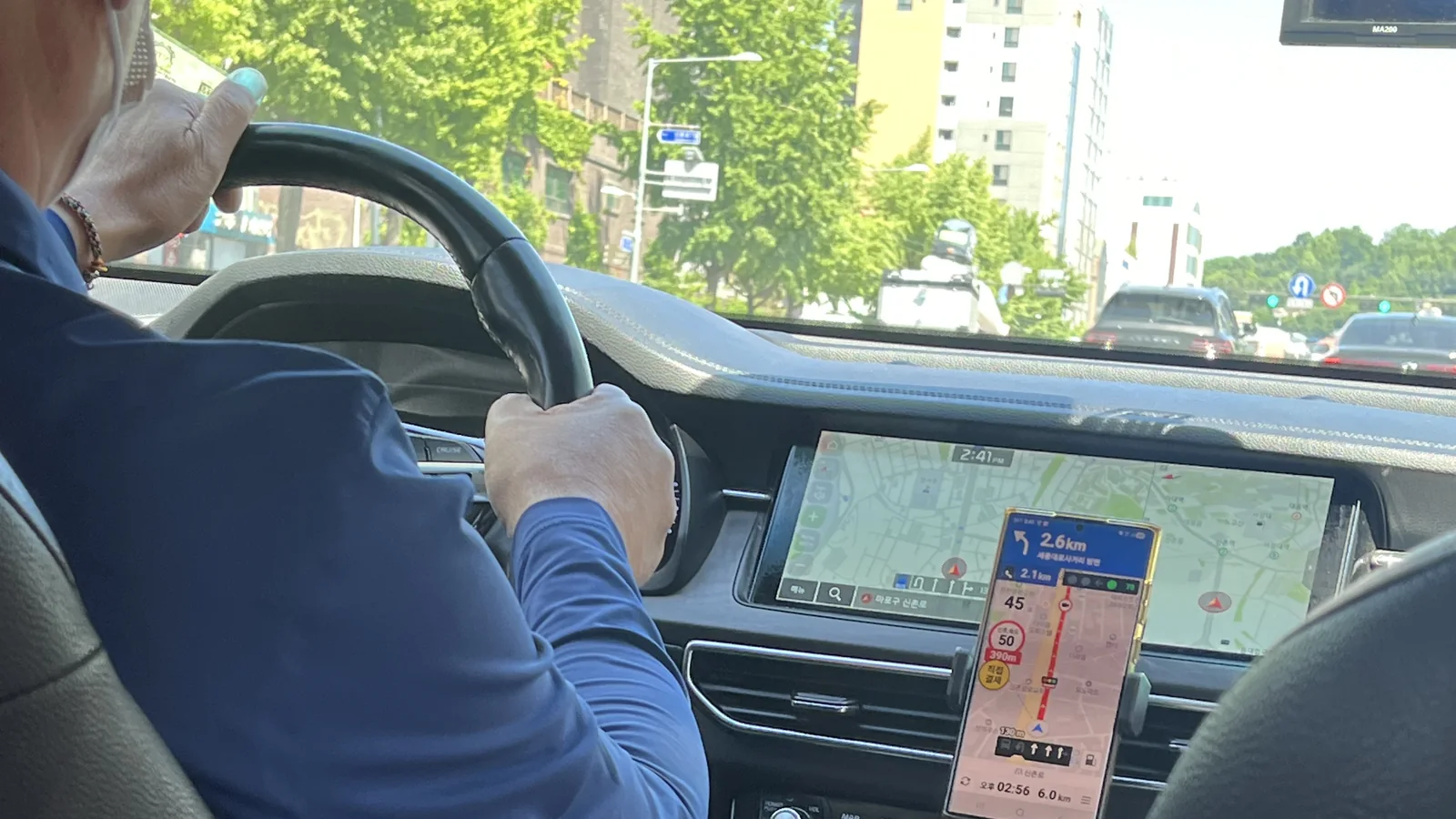 Back-seat view inside a Seoul taxi showing the driver and navigation screen — photo for the Incheon Airport to Seoul Taxi guide (taken by me in Seoul)